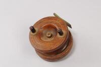 A 19thC mahogany Nottingham style centre pin fishing reel