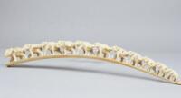 An early 20thC carved ivory tusk