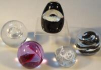 Five Caithness glass paperweights.