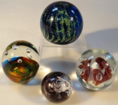 A Mdina glass paperweight