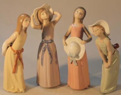 Four Lladro porcelain figurines