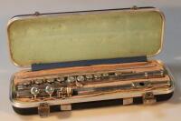 A Boosey & Hawkes stainless steel flute.