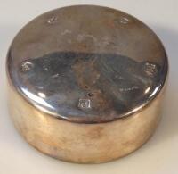 A modern silver paperweight