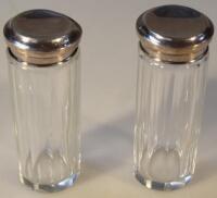 A pair of 20thC silver topped glass jars