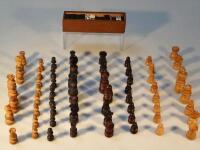 A 19thC set of ebony and ivory dominoes