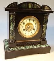 A late Victorian ebonised and marble finish mantel clock