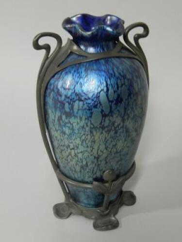 A Loetz glass and pewter vase