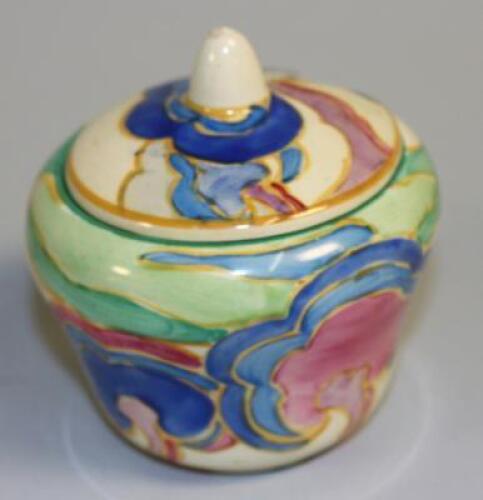 A Newport Pottery Clarice Cliff Oasis preserve pot and cover