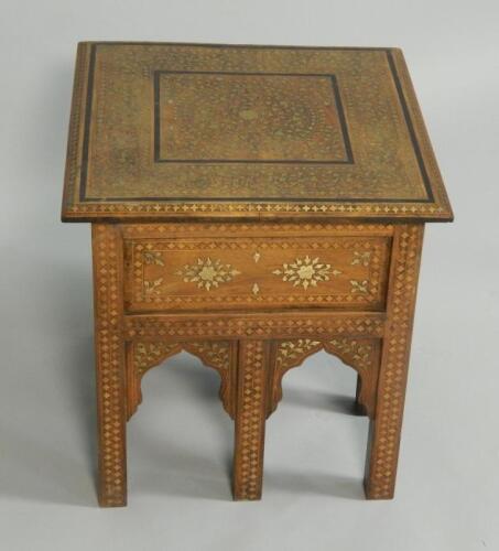 A 20thC Middle Eastern hardwood and brass inlaid square table