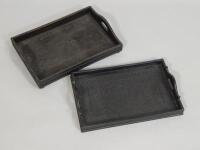 Two similar Middle Eastern ebonised rectangular galleried trays