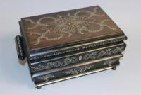 A 19thC Anglo Indian ebony and ivory inlaid two handled workbox