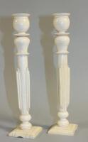 A pair of late 19thC ivory candlesticks