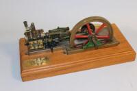 A one inch brass scale model of a Robey horizontal steam engine