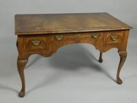 A walnut dressing table in mid 18thC style