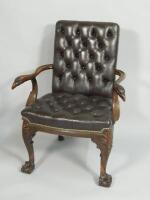 An early 20thC walnut open armchair in George II style