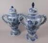 A pair of 19thC Delft two handled jars and covers