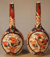 A pair of 19thC Japanese Imari vases