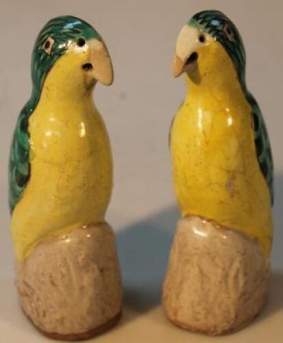 A pair of Chinese earthenware parrots