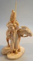 An early 20thC Japanese carved ivory figure group