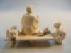 A Japanese carved ivory figure group - 3