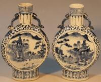 A pair of 19thC Chinese blue and white moon flasks