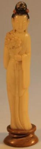 An early 20th century Chinese green soapstone figure of a lady