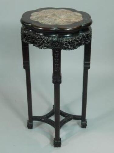 A late 19thC Chinese hardwood jardiniere stand