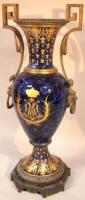 A late 19thC Sevres blue ground vase and stand