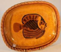 A Winchcombe style oblong stoneware dish