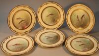 A set of six Mintons cabinet plates painted with fish by James Edwin Dean