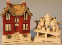 A 19thC Staffordshire cottage money box