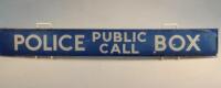 A mid 20thC glass sign reading POLICE PUBLIC CALL BOX in blue and white