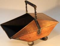 An Arts and Crafts copper coal box