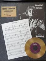 A framed John Lennon Imagine montage