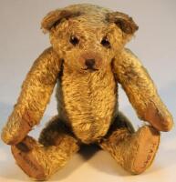 An early 20thC English plush jointed Teddy Bear