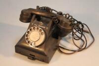 A mid 20thC black bakelite telephone