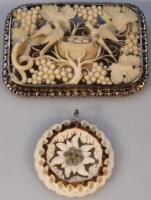 A Victorian ivory and white metal brooch