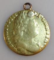 A George III gold guinea with crowned shield verso