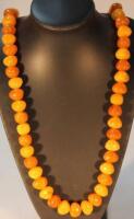 A necklace composed of amber coloured irregular beads