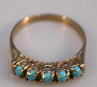 A ladies 9ct gold turquoise ring