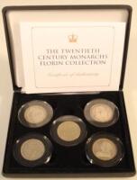 A quantity of cased coin sets