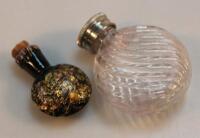 An early 20thC black glass perfume bottle