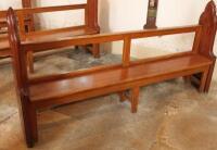 A 19thC and later pitch pine church pew