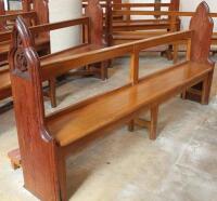 A 19thC and later pitch pine church pew