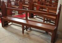 A 19thC and later pitch pine church pew