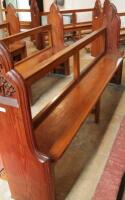 A 19thC and later pitch pine church pew