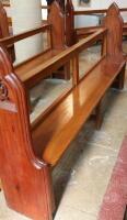 A 19thC and later pitch pine church pew