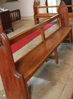 A 19thC and later pitch pine church pew