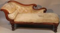 A Victorian mahogany chaise longue