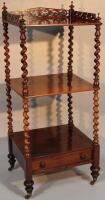 A Victorian rosewood three tier whatnot